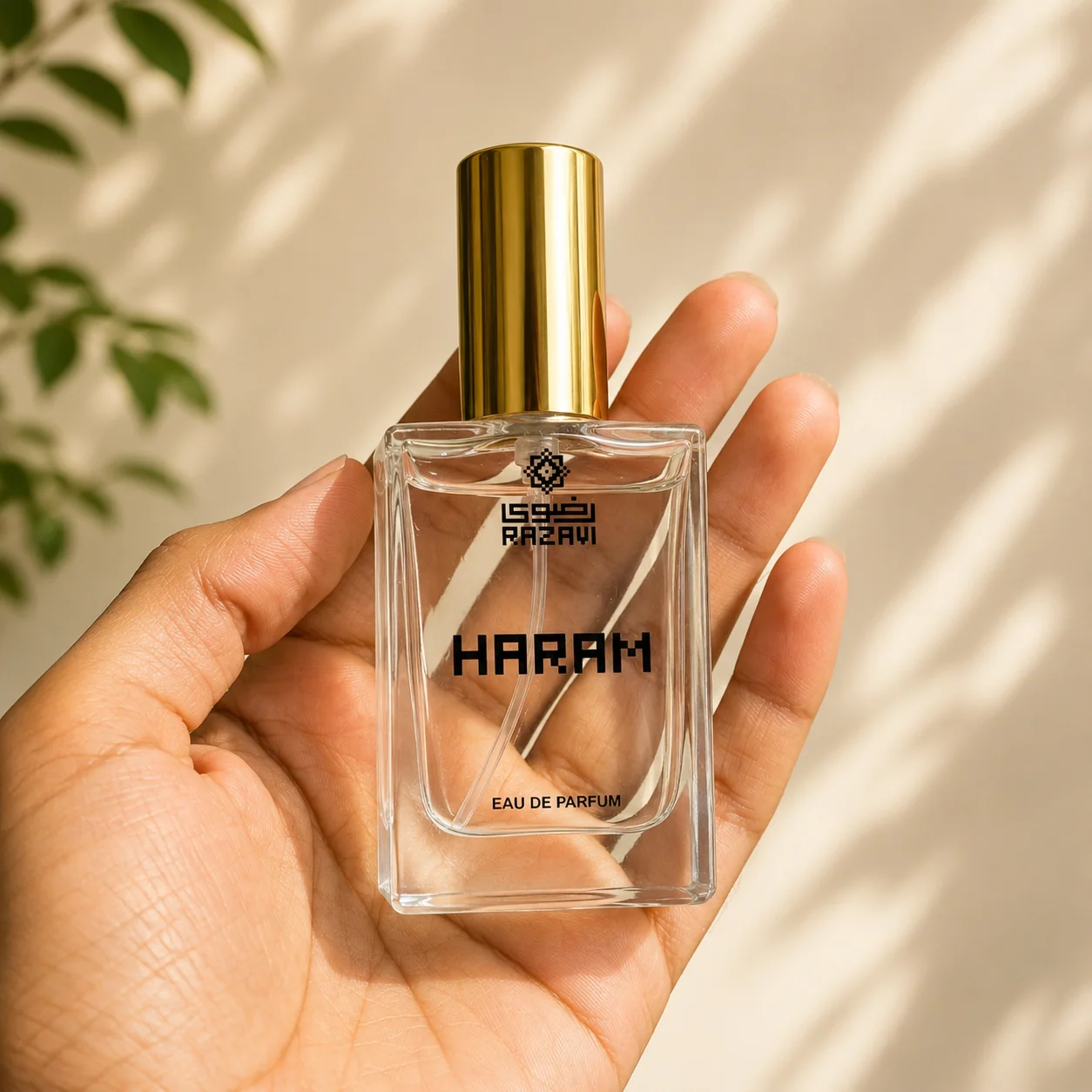 Haram Razavi eau de parfum resting in an open hand